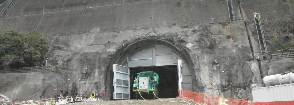 Rock tunnel portal in Himalayan terrain with ventilation
